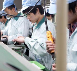 Chiny, fabryka; fot. Bloomberg